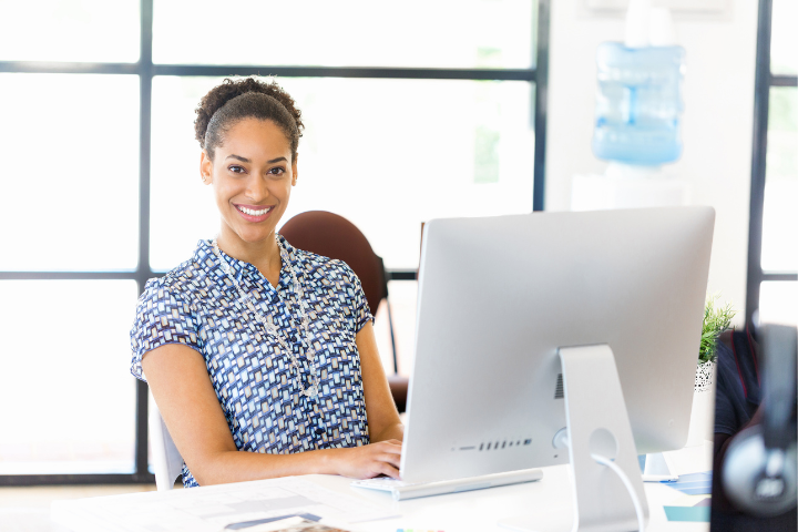 Personal Assistant Vs. Virtual Assistant Working At Workstation