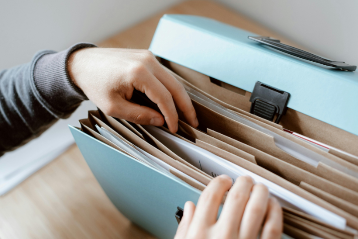 Personal Online Assistant Going Through Documents