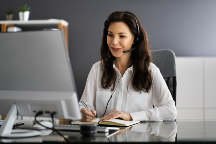 Personal Online Assistant Looking At Monitor