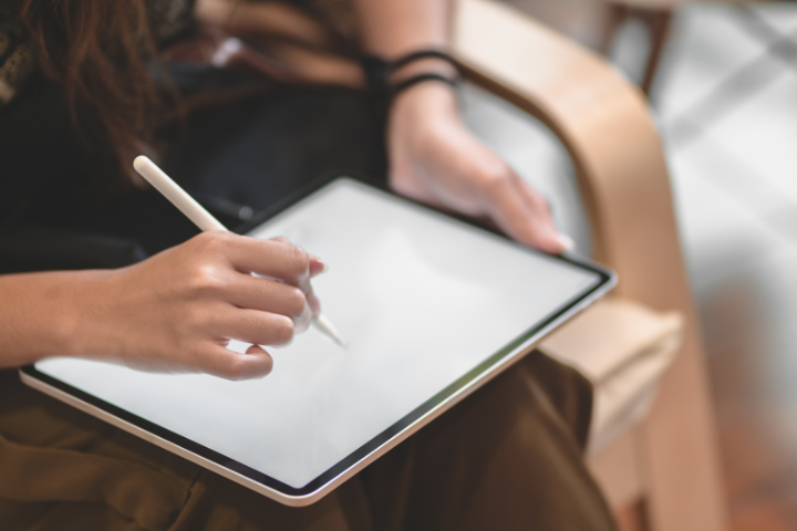 Graphic Designer Sitting And Working