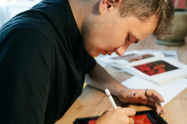 Virtual Graphic Designer Eric Working