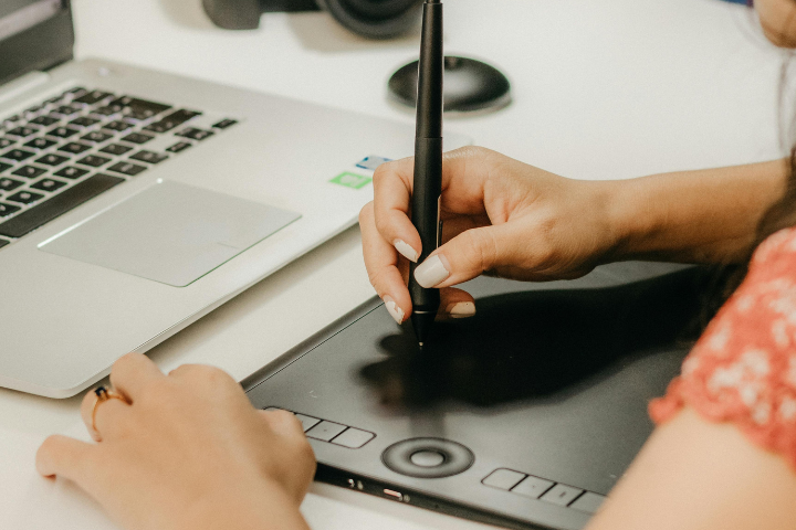 Virtual Graphic Designer Mary Working