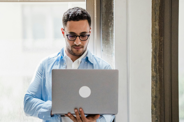 What Do Virtual Assistants Do Working On His Laptop