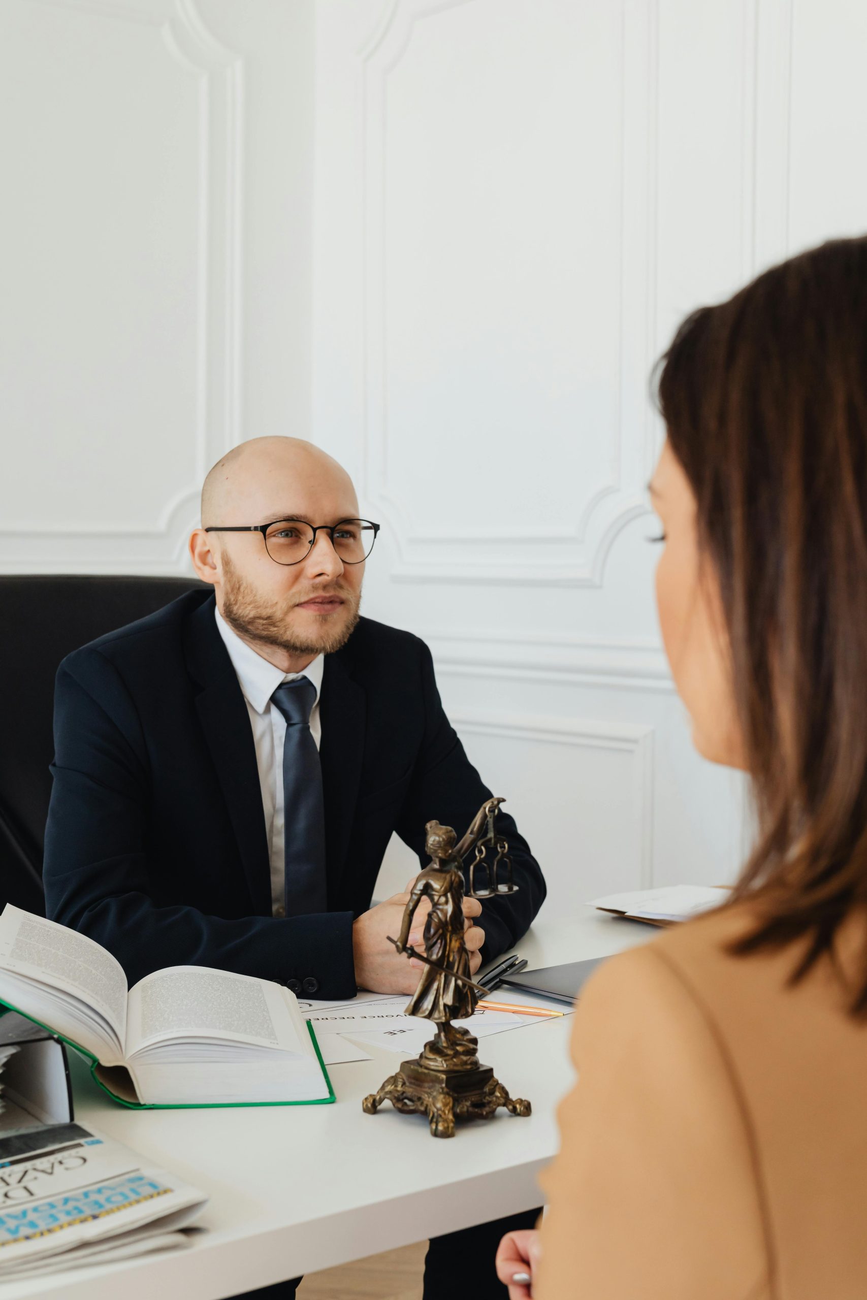 Focus on client with virtual legal assistant doing admin