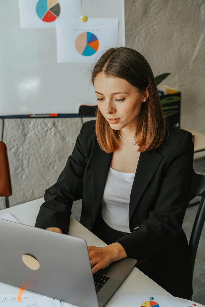 Project Management Virtual Assistant Working On Laptop