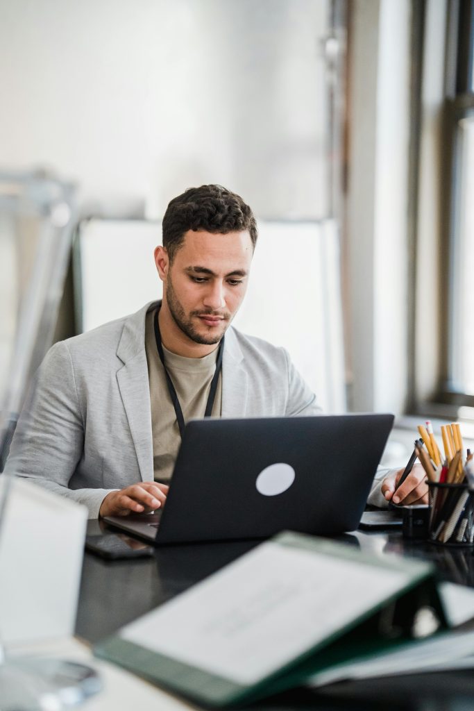 Virtual Lead Generation Assistant Working At His Desk